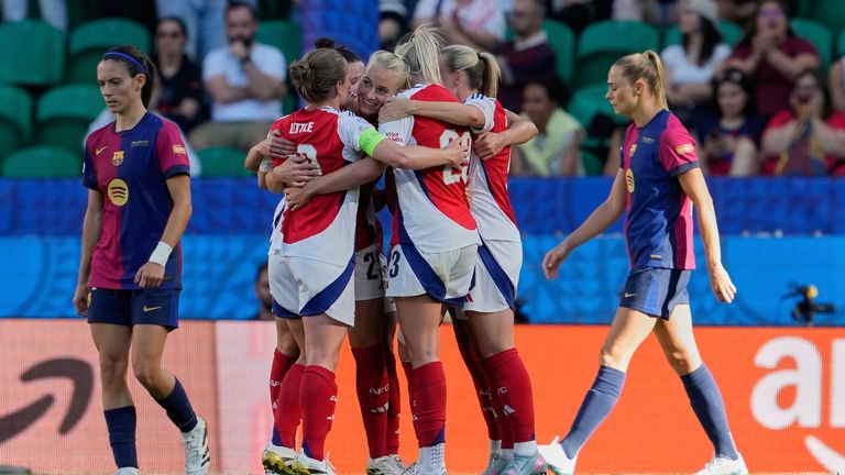 Arsenal's Stina Blackstenius, celebrates with teammates after scoring the opening goal during the women's Champions League final