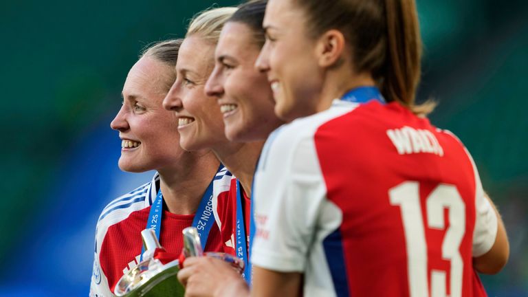 Kim Little, Leah Williamson, Steph Catley and Lia Walti pose with the Champions League trophy