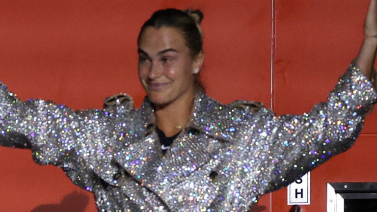 Aryna Sabalenka makes her way to the court for the Battle of the Sexes match between Aryna Sabalenka and Nick Kyrgios in Dubai