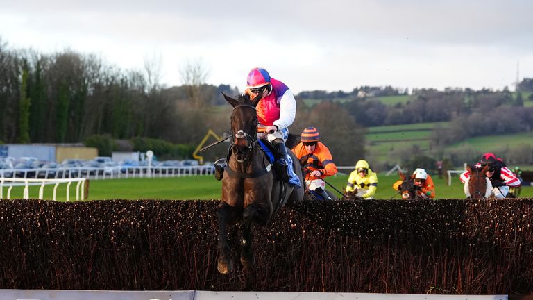 Haiti Couleurs (left) ridden by jockey Sean Bowen on their way to winning the Coral Welsh Grand National Handicap Chase