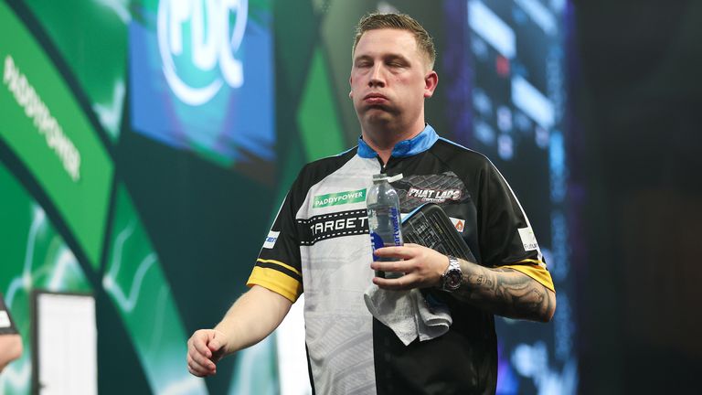 Chris Dobey in action against Xiaochen Zong at the World Darts Championship