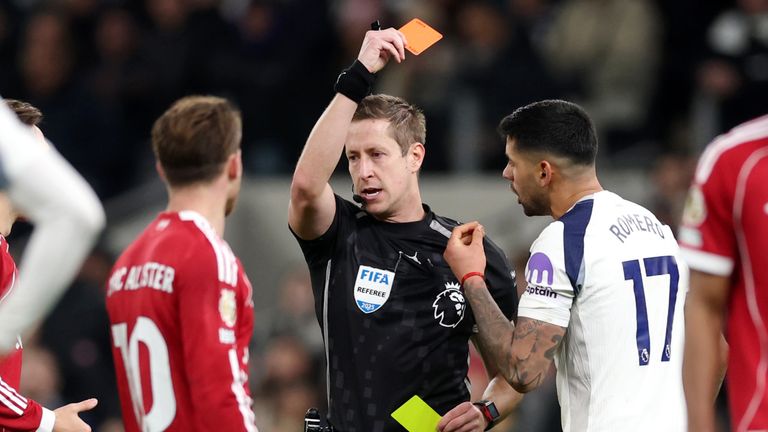 Cristian Romero is sent off after receiving a second yellow card from Referee John Brooks