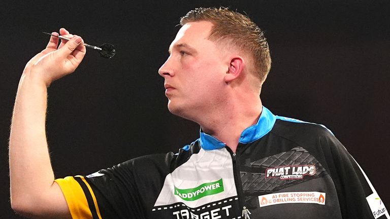 Chris Dobey in action against Xiaochen Zong at the World Darts Championship