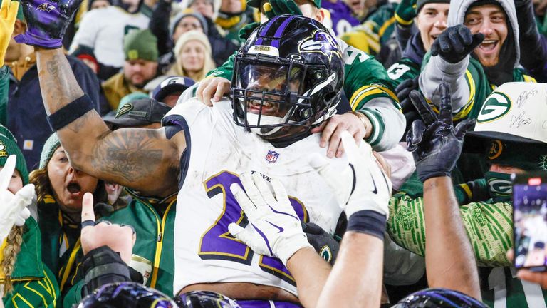 Baltimore Ravens running back Derrick Henry leaps into the crowd after scoring against the Green Bay Packers (AP Photo/Jeffrey Phelps)