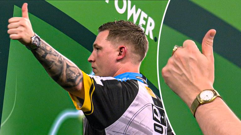 Chris Dobey mimics Andrew Golding's thumbs up celeb