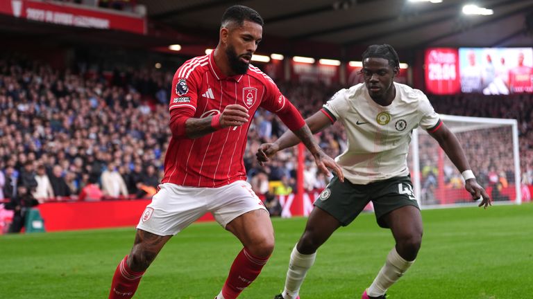 Nottingham Forest's Douglas Luiz (left) and Chelsea's Romeo Lavia battle for the ball during the Premier League match at City Ground, Nottingham. Picture date: Saturday October 18, 2025. PA Photo. Photo credit should read: Bradley Collyer/PA Wire...RESTRICTIONS: EDITORIAL USE ONLY No use with unauthorised audio, video, data, fixture lists, club/league logos or "live" services. Online in-match use limited to 120 images, no video emulation. No use in betting, games or single club/league/player publications.