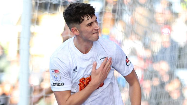 Jordan Storey celebrates after giving Preston the lead at Oxford