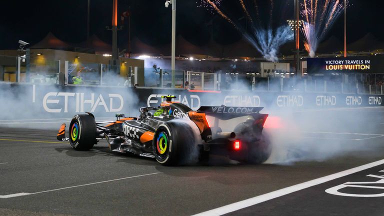 Lando Norris celebrates becoming 2025 F1 world champion at the Abu Dhabi GP