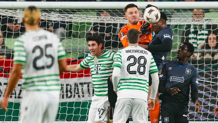 BUDAPEST, HUNGARY - DECEMBER 11: Rangers' Jack Butland (L) and Emmanuel Fernandez struggle to clear the danger during a UEFA Europa League 2025/26 League Phase MD6 match between Ferencvaros and Rangers at the Groupama Arena, on December 11, 2025, in Budapest, Hungary. (Photo by Craig Foy / SNS Group)