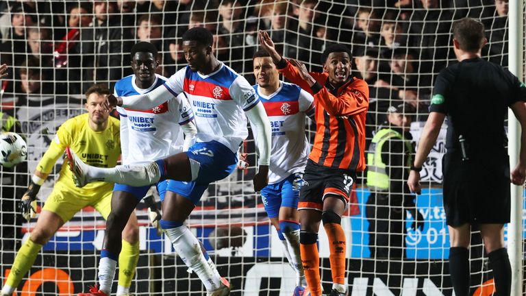 DUNDEE, SCOTLAND - DECEMBER 03: Dundee Utd's Amar Fatah appeals for a handball as Emmanul Fernandez kicks away and Referee David Dickinson looks on during a William Hill Permiership match between Dundee United and Rangers at The CalForth Construction Arena at Tannadice, on December 03, 2025, in Dundee, Scotland. (Photo by Alan Harvey / SNS Group)