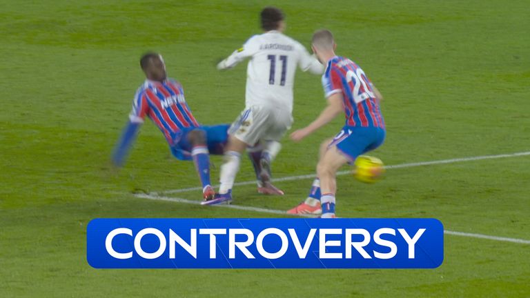 Mitchell challenges Aaronsen in the area and the Leeds man goes down. 