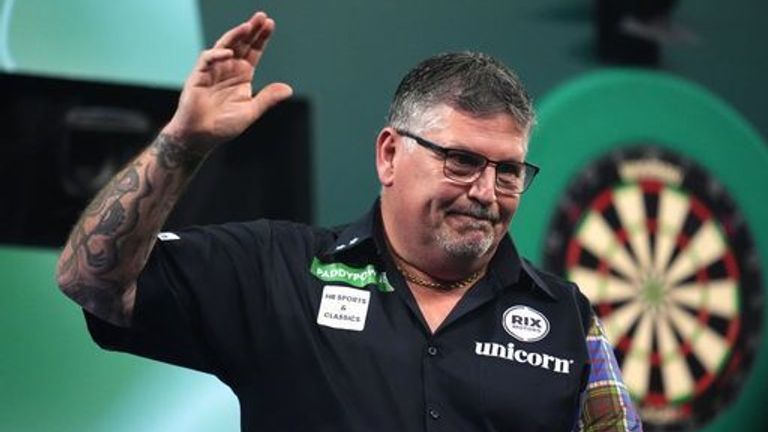 Scotland's Gary Anderson celebrates defeating England's Connor Scutt on day thirteen of the Paddy Power World Darts Championship at the Alex