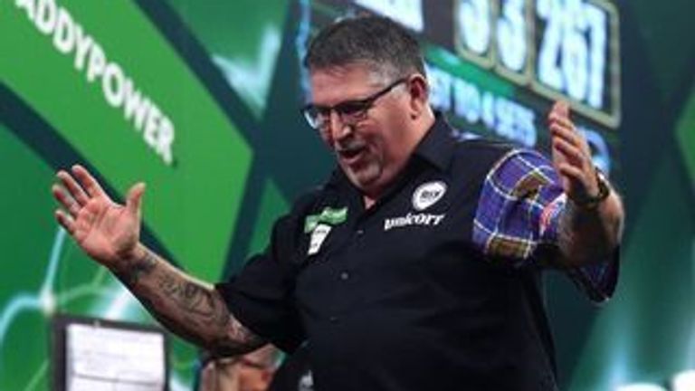 Scotland's Gary Anderson reacts during his match against Netherland's Jermaine Wattimena on day fifteen of the Paddy Power World Darts Champ