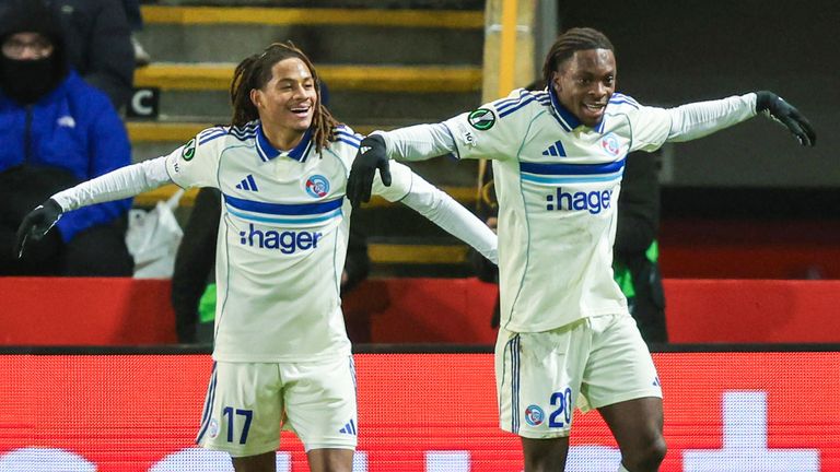 Strasbourg's Martial Godo (R) celebrates with Mathis Amougou after scoring at Aberdeen
