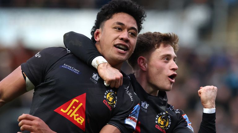 : Greg Fisilau (L) of Exeter Chiefs celebrates with team mate Stephen Varney after scoring their first try during the Gallagher PREM match