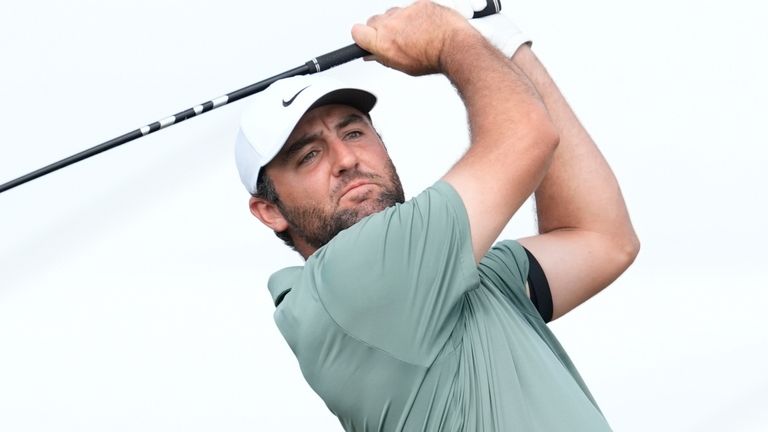 Scottie Scheffler, of the United States, watches his shot on the fourth tee during the first round of the Hero World Challenge PGA Tour at the Albany Golf Club, in New Providence, Bahamas, Thursday, Dec. 4, 2025. (AP Photo/Fernando Llano)
