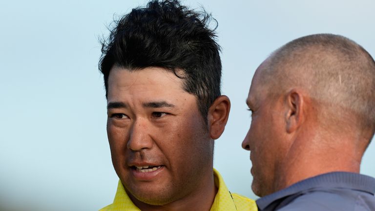 Hideki Matsuyama, of Japan, chats with Alex Noren, of Sweden, during the final round of the Hero World Challenge 