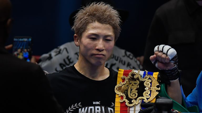 Japan's Naoya Inoue celebrates after beating Alan Picasso