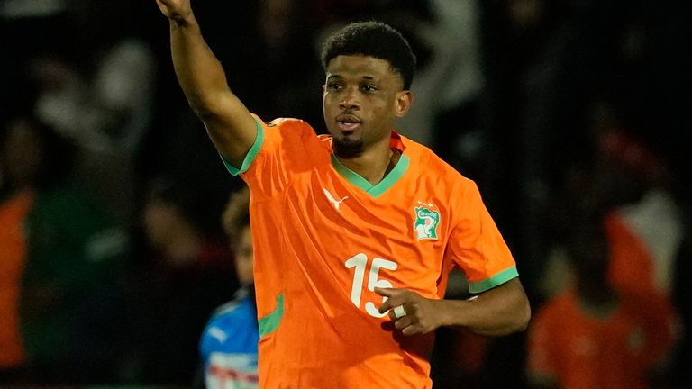 Ivory Coast's Amad Diallo celebrates after scoring against Cameroon