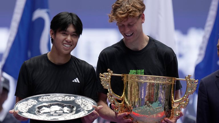 Jannik Sinner with his trophy after defeating Learner Tien in the men's singles final match for the China Open (AP Photo/Mahesh Kumar A.)