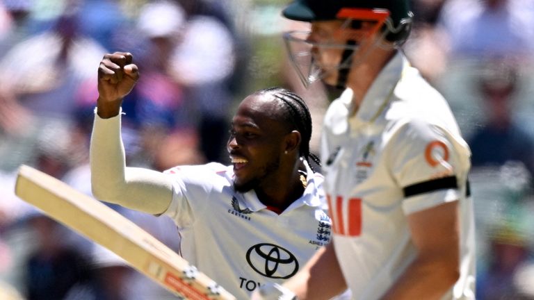 England's Jofra Archer celebrates after dismissing Australia's  Cameron Green on the first day of the third Ashes cricket Test match between Australia and England at the Adelaide Oval in Adelaide on December 17, 2025. (Photo by William WEST / AFP) / --IMAGE RESTRICTED TO EDITORIAL USE - STRICTLY NO COMMERCIAL USE--