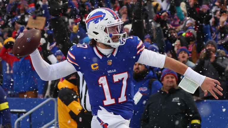 Buffalo Bills quarterback Josh Allen reacts after running for a touchdown against the Cincinnati Bengals during the second half of an NFL football game, Sunday, Dec. 7, 2025, in Orchard Park, N.Y. (AP Photo/Jeffrey T. Barnes)