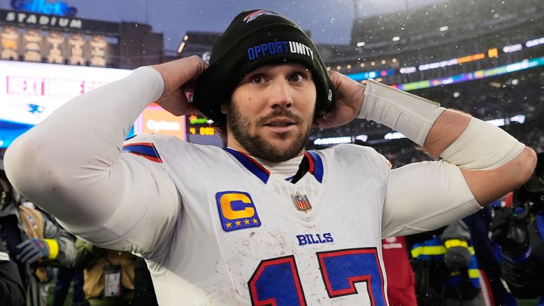Buffalo Bills quarterback Josh Allen (17) reacts after an NFL football game against the New England Patriots in Foxborough, Mass., Sunday, Dec. 14, 2025. (AP Photo/Charles Krupa)