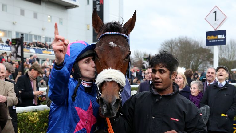 Paddy Brennan kisses Cue Card after winning the 2015 King George