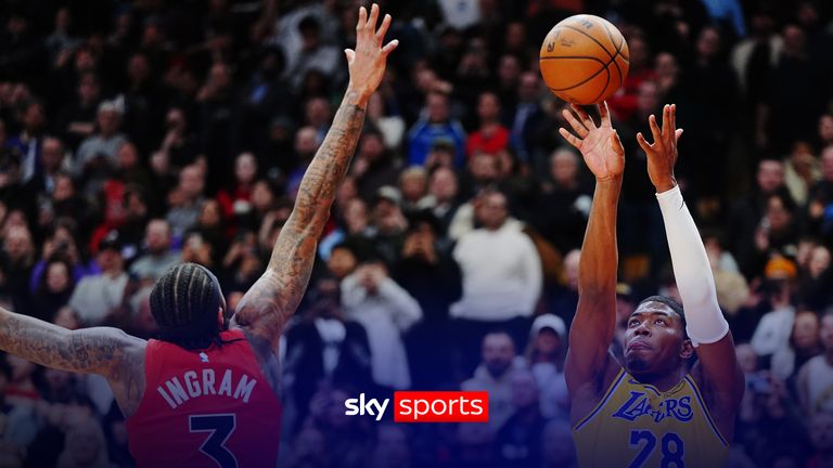Los Angeles Lakers' Rui Hachimura (28) shoots the winning basket over Toronto Raptors' Brandon Ingram (3) during second-half NBA basketball game action in Toronto, Thursday, Dec. 4, 2025. (Frank Gunn/The Canadian Press via AP)
