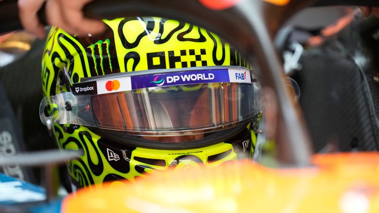 McLaren driver Lando Norris of Britain gets ready for the first practice for the he Abu Dhabi Formula One Grand Prix in Abu Dhabi, United Arab Emirates, Friday, Dec. 5, 2025. (AP Photo/Darko Bandic)