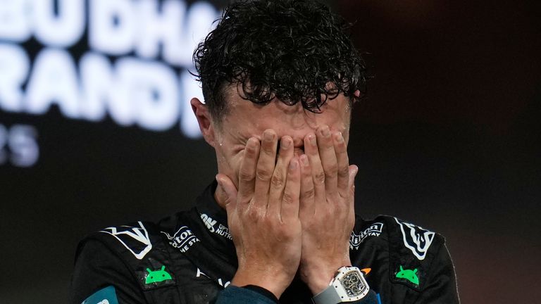 Lando Norris reacts after becoming a world champion 