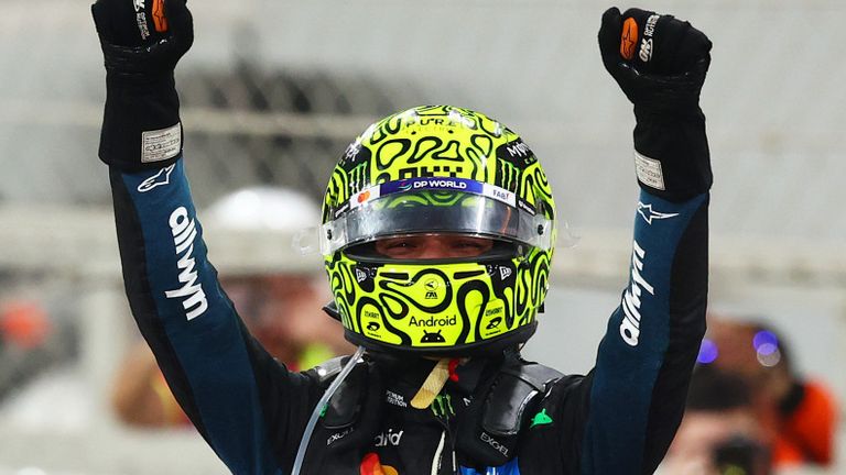 Lando Norris gets out of the car after becoming world champion