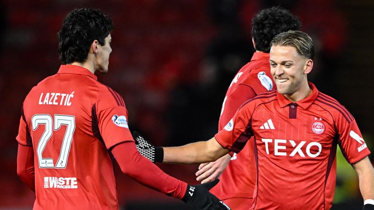 Marko Lazetic (L) scored twice for Aberdeen as they drew with St Mirren