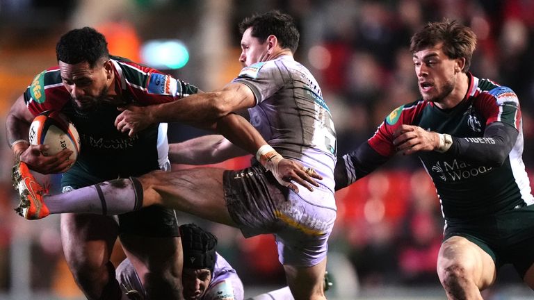 Leicester Tigers' Solomone Kata is tackled by Gloucester's Josh Basham and Tomos Williams