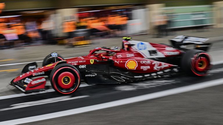 Ferrari driver Lewis Hamilton of Britain makes a pit stop during the Formula One Grand Prix qualifying in Abu Dhabi, United Arab Emirates, Saturday, Dec. 6, 2025. (Giuseppe Cacace/Pool via AP)