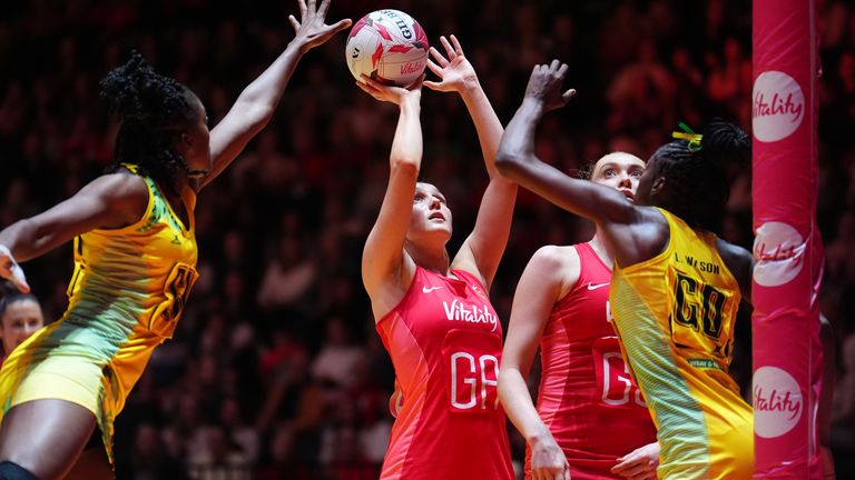 England's Lois Pearson shoots over Jamaica's Kadie-Ann Dehaney (left) and Latanya Wilson (right), during the Vitality Netball Horizon Series