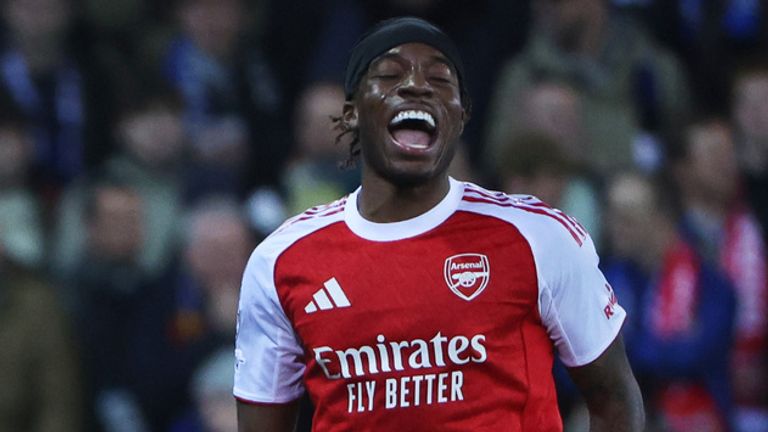 Arsenal's Noni Madueke celebrates after scoring the opening goal during the Champions League opening phase soccer match between Club Brugge and Arsenal in Bruges, Belgium, Wednesday, Dec. 10, 2025. (AP Photo/Omar Havana)