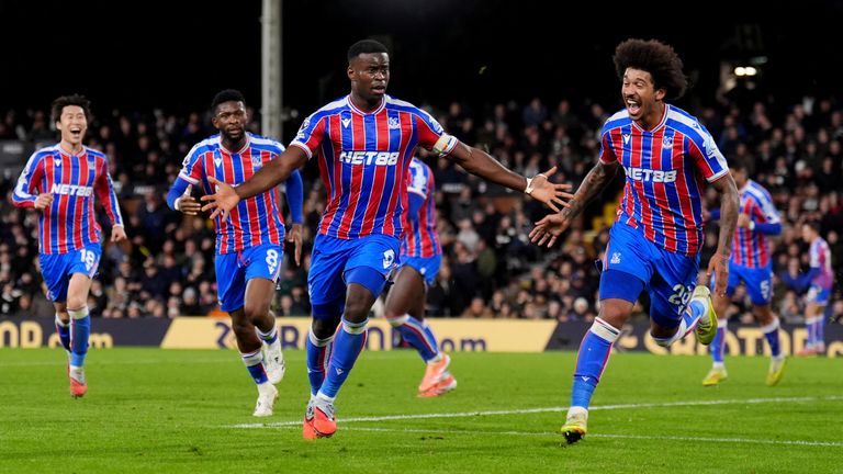 Marc Guehi celebrates after sealing the win for Crystal Palace at Craven Cottage
