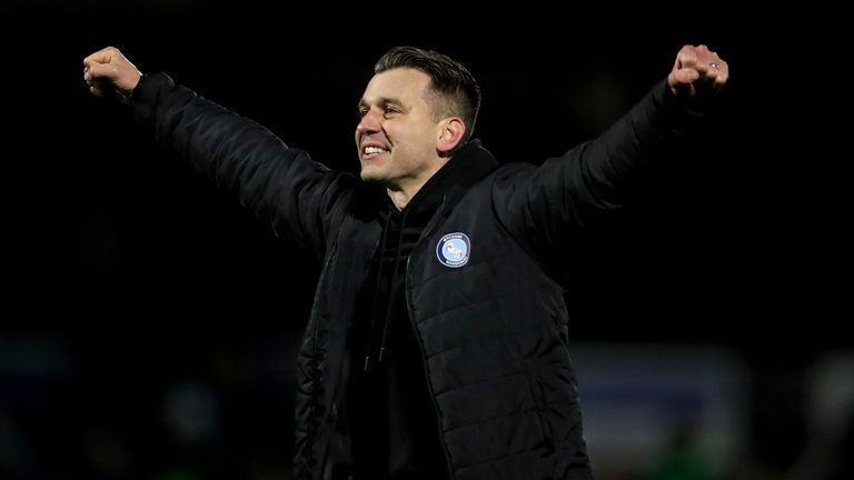 Matt Bloomfield celebrating during his time as Wycombe Wanderers manager