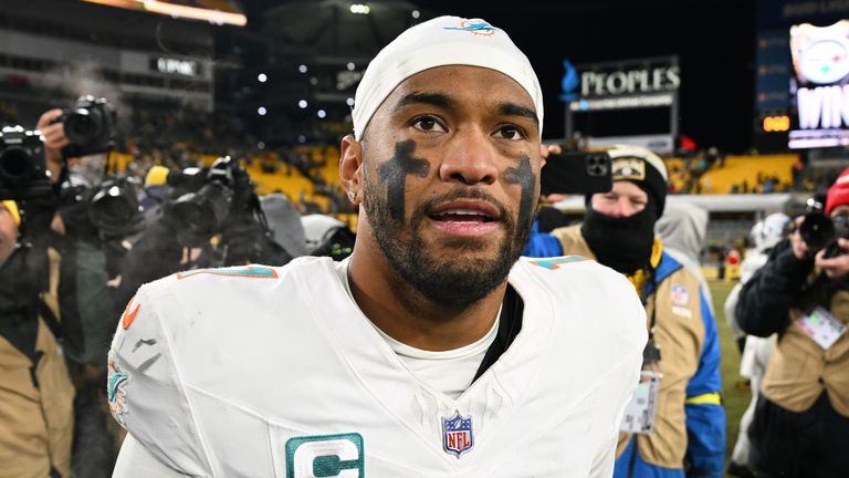 Miami Dolphins quarterback Tua Tagovailoa walks off the field after a game against the Pittsburgh Steelers (AP Photo/Justin Berl)