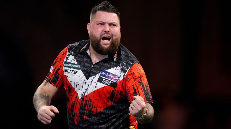 Michael Smith reacts during his second round match against Kevin Doets on day five of the Paddy Power World Darts Championship at Alexandra 