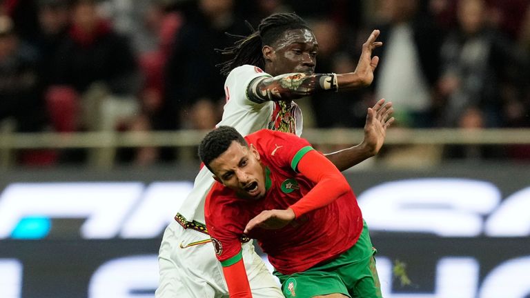 Morocco's Azz-Eddine Ounahi is challenged by Mali's Yves Bissouma