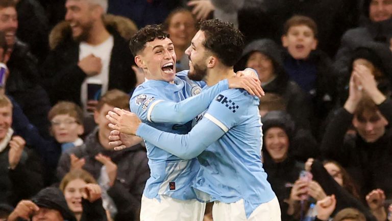 Phil Foden and Rayan Cherki celebrate as Manchester City take a 3-0 lead