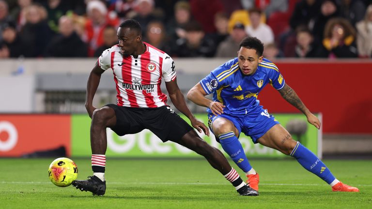 Michael Kayode controls the ball under pressure from Noah Okafor 