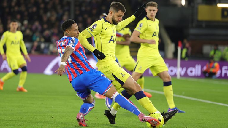 Rodrigo Bentancur rides a challenge from Nathaniel Clyne