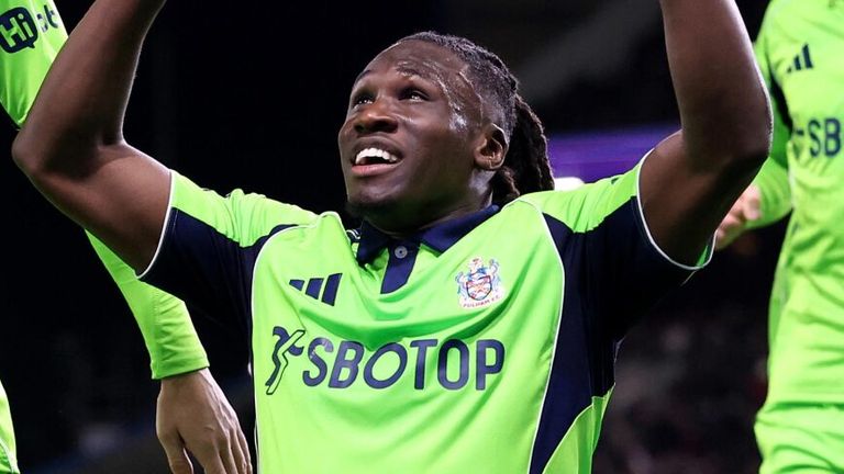 Calvin Bassey celebrates after restoring Fulham's lead at Turf Moor
