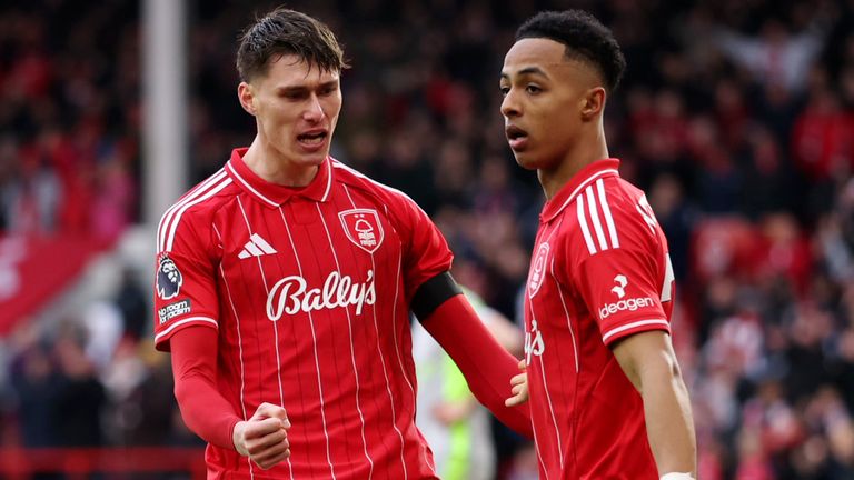 Omari Hutchinson celebrates with team-mate Nicolo Savona after equalising for Nottingham Forest against Manchester City