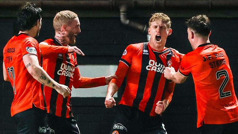 DUNDEE, SCOTLAND - DECEMBER 17: Dundee United's Zac Sapsford (centre) celebrates scoring to make it 2-1 during a William Hill Premiership match between Dundee United and Celtic at the CalForth Construction Arena at Tannadice Park, on December 17, 2025, in Dundee, Scotland. (Photo by Craig Williamson / SNS Group)
