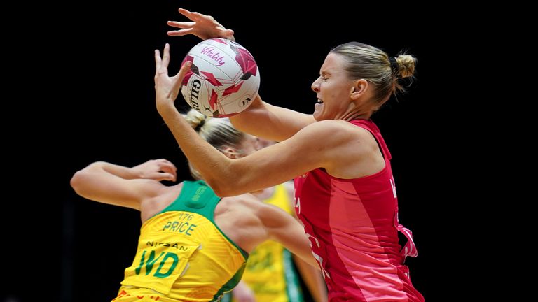 England's Sasha Glasgow (right) and Australia's Jamie-Lee Price during the final of the 2024 Vitality Netball Nations Cup
