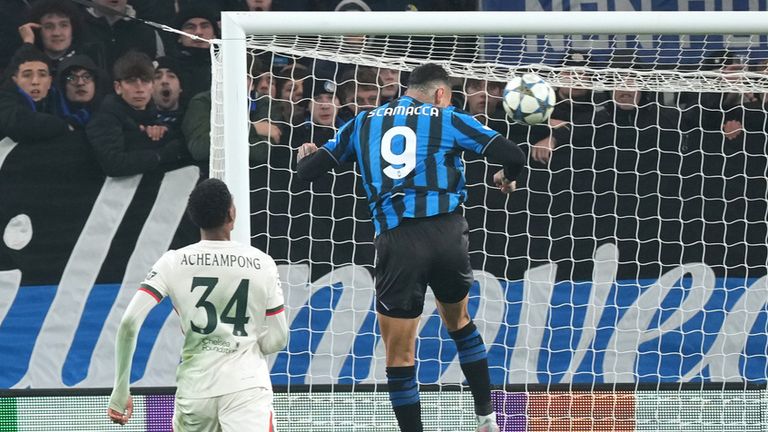 Atalanta's Gianluca Scamacca scores his side's first goal during the Champions League opening phase soccer match between Atalanta and Chelsea, in Bergamo, Italy, Tuesday, Dec. 9, 2025. (AP Photo/Antonio Calanni)